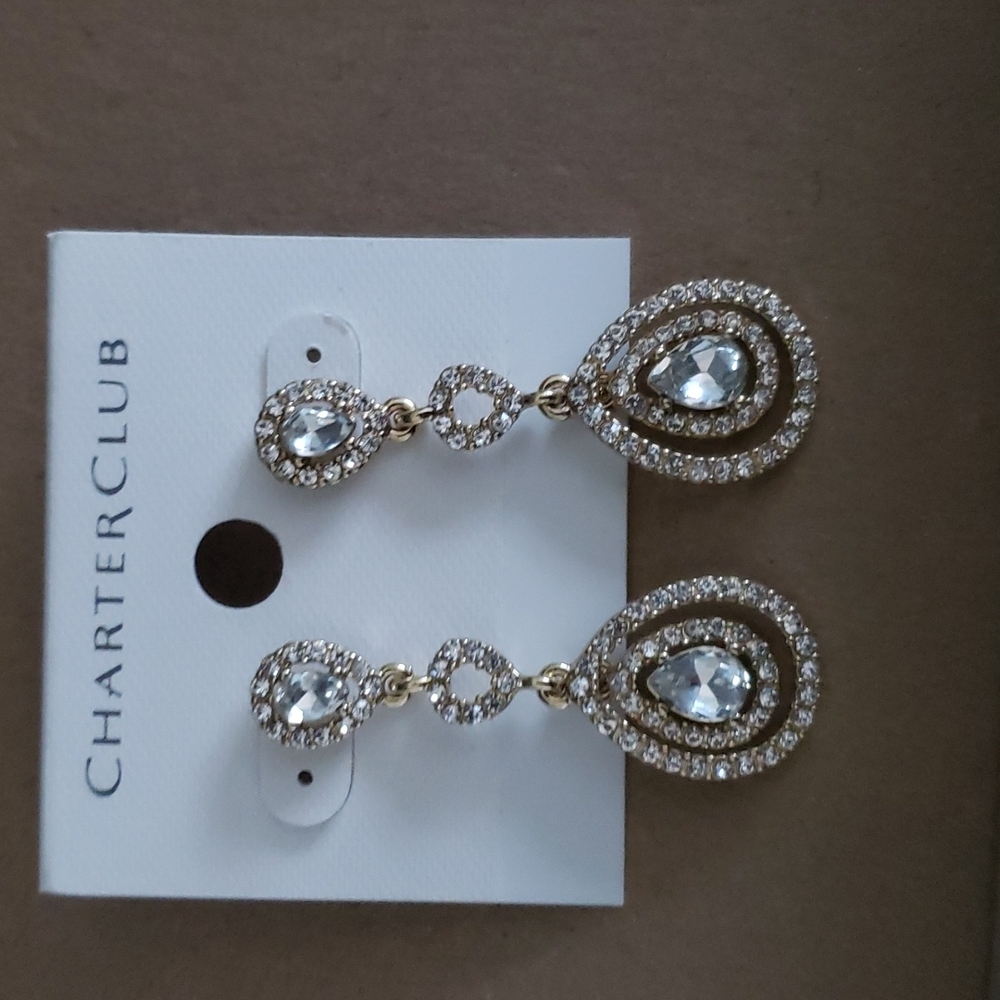 Gold tone teardrop crystal earrings